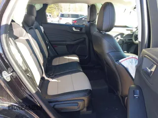 2021 Ford Escape Titanium with VIN 1FMCU9J91MUB36425, listed as a IAAI auction lot 41619575 with 35,737 mi miles and . Bid and sale history available at carsss.com. Image 8.