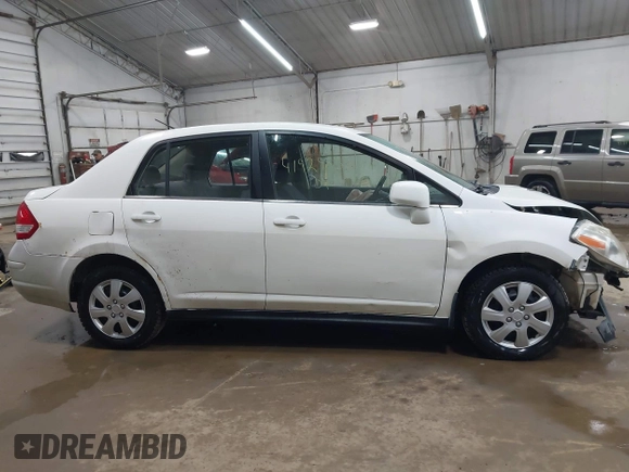 2009 Nissan Versa 1.8 S with VIN 3N1BC11E19L382848, listed as a IAAI auction lot 41929836 with 185,990 mi miles. Bid and sale history available at carsss.com. Image 13.