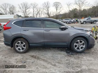2019 Honda CR-V EX with VIN 7FARW1H57KE037678, listed as a IAAI auction lot 41790923 with 61,754 mi miles and . Bid and sale history available at DreamBid. Image 13.