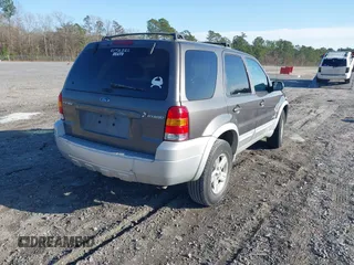 2006 Ford Escape Hybrid with VIN 1FMYU96H56KB49358, listed as a IAAI auction lot 41600419 with 161,661 mi miles and . Bid and sale history available at DreamBid. Image 4.