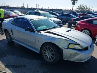 2000 Ford Mustang with VIN 1FAFP4044YF194790, listed as a IAAI auction lot 41675312 with 192,736 mi miles. Bid and sale history available at carsss.com. Image 1.