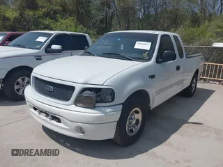2004 Ford F-150 XL with VIN 2FTRX17264CA69306, listed as a IAAI auction lot 41869054 with 247,183 mi miles and . Bid and sale history available at DreamBid. Image 2.