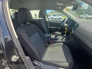2024 Volkswagen Jetta S with VIN 3VW5M7BU6RM050864, listed as a IAAI auction lot 42854244 with 23,681 mi miles and . Bid and sale history available at DreamBid. Image 3.