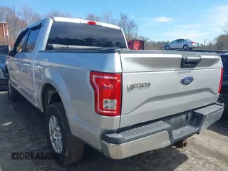 2015 Ford F-150 XLT with VIN 1FTEW1EG5FFA40936, listed as a IAAI auction lot 42011697 with 199,722 mi miles. Bid and sale history available at carsss.com. Image 3.