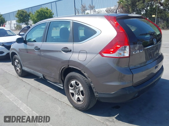 2013 Honda CR-V LX with VIN 3CZRM3H34DG705066, listed as a IAAI auction lot 42661478 with 318,027 mi miles and . Bid and sale history available at DreamBid. Image 3.
