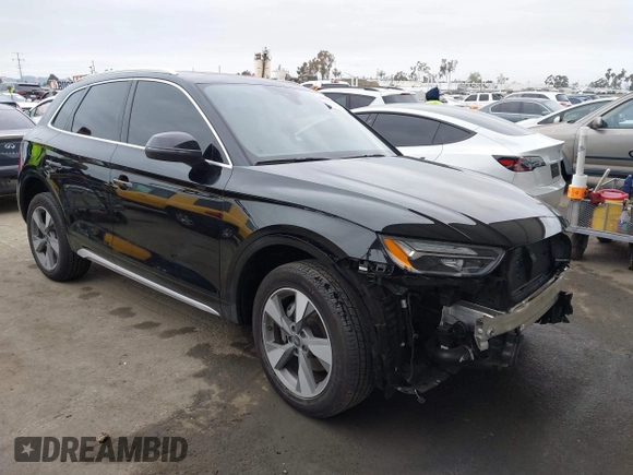 2023 Audi Q5 Premium Plus z VIN WA1BBAFY7P2187588, wystawiony jako IAAI lot #42052046 z przebiegiem 18 987 mil mil oraz . Historia ofert i sprzedaży dostępna na DreamBid. Obrazek 1.