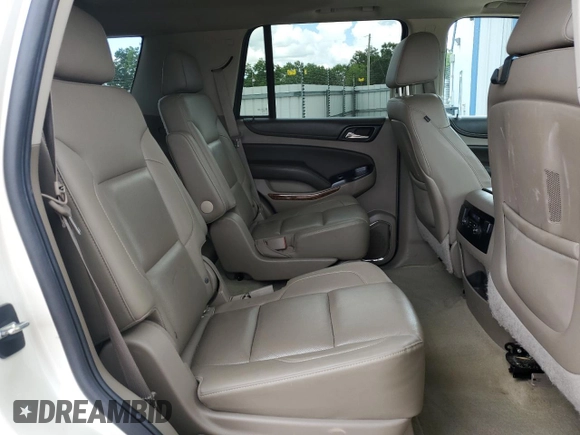 2015 Chevrolet Tahoe LTZ z VIN 1GNSCCKC0FR737641, wystawiony jako Copart lot #59797095 z przebiegiem 85 932 mil mil oraz Szkoda całkowita • Salvage title. Historia ofert i sprzedaży dostępna na DreamBid. Obrazek 11.