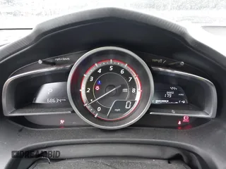 2016 Mazda 3 S Grand Touring z VIN JM1BM1N37G1351062, wystawiony jako IAAI lot #41573775 z przebiegiem 68 634 mil mil oraz . Historia ofert i sprzedaży dostępna na DreamBid. Obrazek 7.