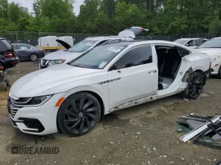 2020 Volkswagen Arteon SEL R-Line with VIN WVWHR7AN8LE014652, listed as a Copart auction lot 56052985 with 94,324 mi miles and Salvage title. Bid and sale history available at DreamBid. Image 1.