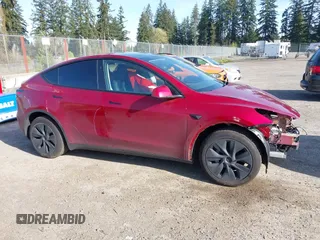 2024 Tesla Model Y Long Range with VIN 7SAYGDEE9RF199805, listed as a IAAI auction lot 42018221 with 7,359 mi miles. Bid and sale history available at carsss.com. Image 14.