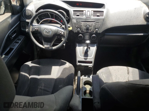 2012 Mazda 5 Touring with VIN JM1CW2CL2C0141959, listed as a Copart auction lot 61286614 with 171,189 mi miles and Salvage Title. Bid and sale history available at DreamBid. Image 8.