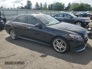 2014 Mercedes-Benz E 350 Luxury with VIN WDDHF8JB9EB009443, listed as a Copart auction lot 65094745 with 69,245 mi miles and Salvage title. Bid and sale history available at DreamBid. Image 4.