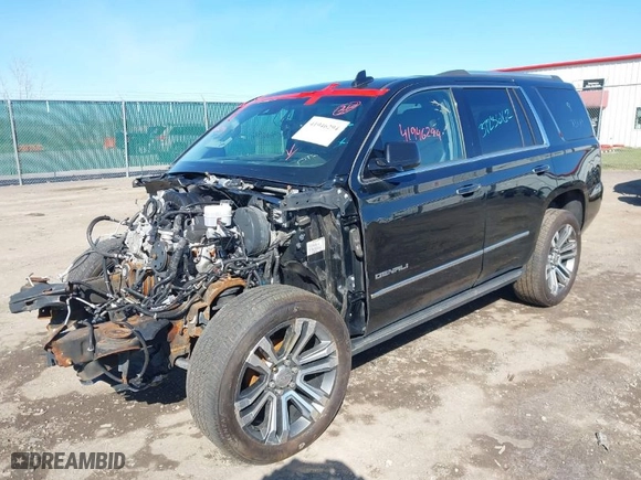 2018 GMC Yukon Denali with VIN 1GKS2CKJ3JR281853, listed as a IAAI auction lot 41946294 with 125,622 mi miles. Bid and sale history available at carsss.com. Image 2.