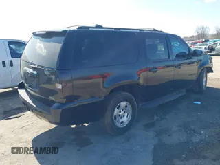 2011 Chevrolet Suburban LT with VIN 1GNSKJE30BR201074, listed as a IAAI auction lot 41986073 with 182,611 mi miles. Bid and sale history available at carsss.com. Image 4.