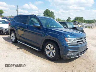 2018 Volkswagen Atlas SE z VIN 1V2LR2CA9JC558656, wystawiony jako IAAI lot #42224739 z przebiegiem 242 033 mil mil oraz . Historia ofert i sprzedaży dostępna na DreamBid. Obrazek 1.