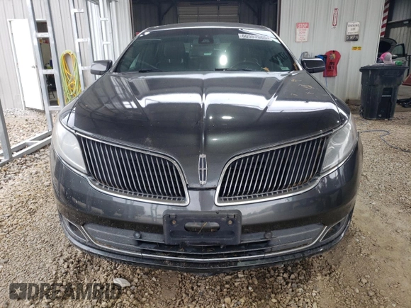 2016 Lincoln MKS z VIN 1LNHL9DK9GG601740, wystawiony jako Copart lot #60557565 z przebiegiem 89 350 mil mil oraz Szkoda całkowita • Salvage title. Historia ofert i sprzedaży dostępna na DreamBid. Obrazek 5.