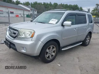2011 Honda Pilot Touring with VIN 5FNYF4H90BB022354, listed as a IAAI auction lot 41965082 with 126,505 mi miles and . Bid and sale history available at carsss.com. Image 18.