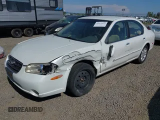 2000 Nissan Maxima GXE with VIN JN1CA31D7YT700656, listed as a IAAI auction lot 42675421 with 94,006 mi miles and . Bid and sale history available at DreamBid. Image 2.