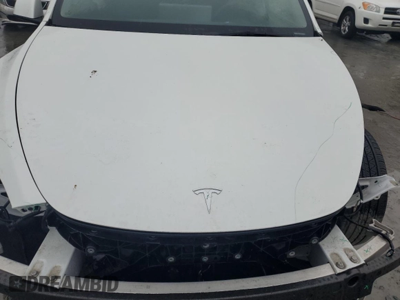 2023 Tesla Model Y Long Range z VIN 7SAYGDEE1PA114563, wystawiony jako Copart lot #44423505 z przebiegiem Nie podano mil oraz Szkody całkowita. Historia ofert i sprzedaży dostępna na DreamBid. Obrazek 11.