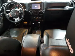 2016 Jeep Wrangler Unlimited Sport с VIN 1C4BJWDG2GL158106, выставлен на аукционе Copart как лот 59557565 с пробегом 114 242 миль миль и Списание • Salvage title. История ставок и продаж доступна на DreamBid. Изображение 8.