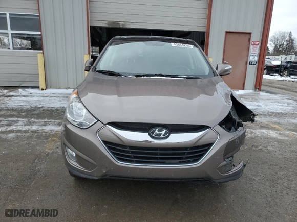2011 Hyundai Tucson Limited with VIN KM8JUCAC1BU315061, listed as a Copart auction lot 45864255 with 55,057 mi miles and Salvage Title. Bid and sale history available at carsss.com. Image 5.