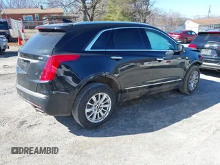 2018 Cadillac XT5 FWD with VIN 1GYKNARS5JZ235585, listed as a IAAI auction lot 41607440 with 77,220 mi miles and . Bid and sale history available at DreamBid. Image 4.