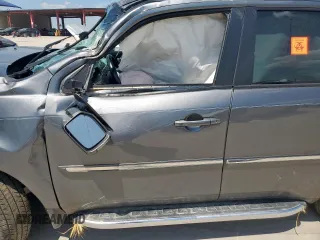 2013 Honda Pilot Touring z VIN 5FNYF3H97DB032389, wystawiony jako Copart lot #58387645 z przebiegiem Nie podano mil oraz Szkoda całkowita • Salvage title. Historia ofert i sprzedaży dostępna na DreamBid. Obrazek 7.