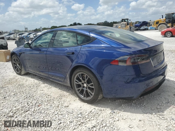 2021 Tesla Model S Long Range с VIN 5YJSA1E50MF452893, выставлен на аукционе Copart как лот 54139865 с пробегом 56 410 миль миль и Списание • Salvage title. История ставок и продаж доступна на DreamBid. Изображение 2.