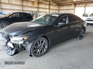 2016 Mazda 6 i Grand Touring с VIN JM1GJ1W53G1408761, выставлен на аукционе Copart как лот 56134165 с пробегом 144 696 миль миль и Списание • Salvage title. История ставок и продаж доступна на DreamBid. Изображение 1.