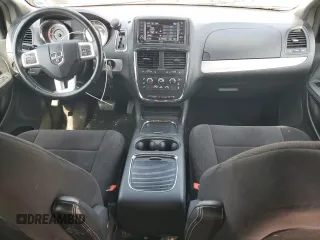2014 Dodge Grand Caravan SXT with VIN 2C4RDGCG4ER114464, listed as a Copart auction lot 52480965 with 125,212 mi miles and Salvage Title. Bid and sale history available at DreamBid. Image 8.
