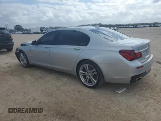 2015 BMW 7 Series 740Li xDrive with VIN WBAYF4C57FGS99225, listed as a Copart auction lot 82167004 with 145,711 mi miles and Salvage Title. Bid and sale history available at carsss.com. Image 2.
