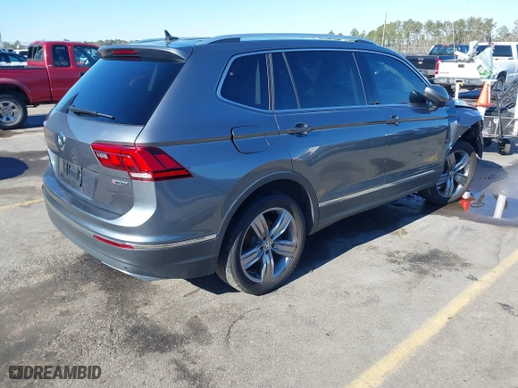 2021 Volkswagen Tiguan SE with VIN 3VV2B7AX2MM001713, listed as a IAAI auction lot 41357396 with 81,872 mi miles. Bid and sale history available at carsss.com. Image 4.