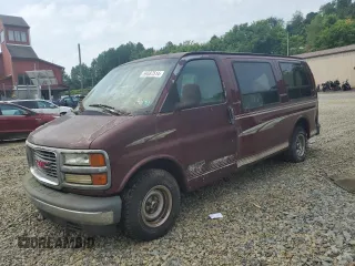 2001 GMC Savana z VIN 1GDFG15W311128037, wystawiony jako Copart lot #82888904 z przebiegiem Nie podano mil oraz Szkoda całkowita • Salvage title. Historia ofert i sprzedaży dostępna na DreamBid. Obrazek 1.