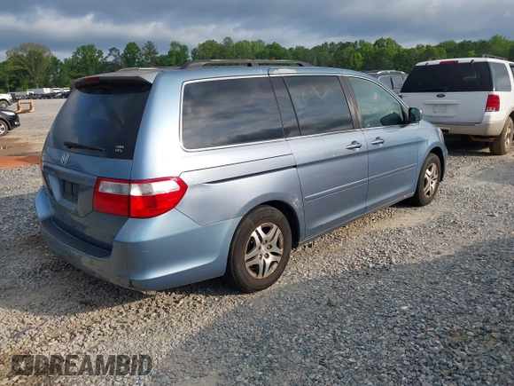 2007 Honda Odyssey EX with VIN 5FNRL38457B037239, listed as a IAAI auction lot 42034219 with 291,885 mi miles. Bid and sale history available at carsss.com. Image 4.