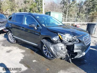 2017 Subaru Outback Touring with VIN 4S4BSETC6H3399587, listed as a IAAI auction lot 41225790 with 89,228 mi miles. Bid and sale history available at carsss.com. Image 1.