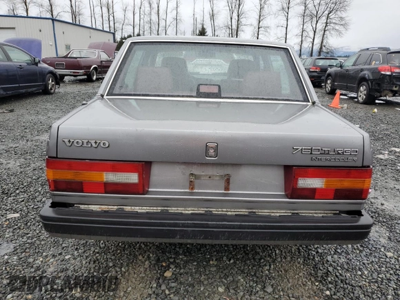 1990 Volvo 760 with VIN YV1GA8740L0089828, listed as a Copart auction lot 84668844 with 272,600 mi miles and Salvage title. Bid and sale history available at DreamBid. Image 6.