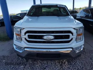 2022 Ford F-150 XL with VIN 1FTMF1C5XNKD23707, listed as a Copart auction lot 70062144 with 58,649 mi miles and Salvage title. Bid and sale history available at DreamBid. Image 5.