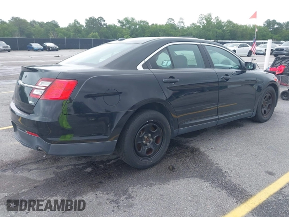 2014 Ford Police Interceptor with VIN 1FAHP2MKXEG105669, listed as a IAAI auction lot 42240752 with 133,148 mi miles and . Bid and sale history available at DreamBid. Image 4.