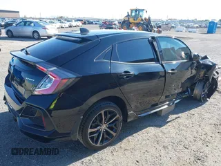2021 Honda Civic Sport with VIN SHHFK7H48MU415898, listed as a IAAI auction lot 42130231 with 56,315 mi miles and . Bid and sale history available at DreamBid. Image 4.