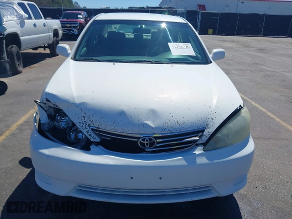2006 Toyota Camry STD with VIN 4T1BE32KX6U734944, listed as a IAAI auction lot 41745226 with 243,967 mi miles. Bid and sale history available at carsss.com. Image 12.
