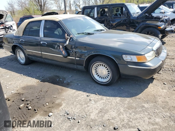 1999 Mercury Grand Marquis LS with VIN 2MEFM75W0XX731008, listed as a Copart auction lot 54375795 with 88,080 mi miles and Salvage Title. Bid and sale history available at DreamBid. Image 4.