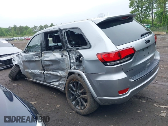 2019 Jeep Grand Cherokee Laredo E with VIN 1C4RJFAG5KC567003, listed as a IAAI auction lot 42390239 with 82,505 mi miles and . Bid and sale history available at DreamBid. Image 14.