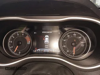 2016 Jeep Cherokee Trailhawk with VIN 1C4PJMBS0GW169184, listed as a IAAI auction lot 42255346 with 152,802 mi miles and . Bid and sale history available at DreamBid. Image 7.
