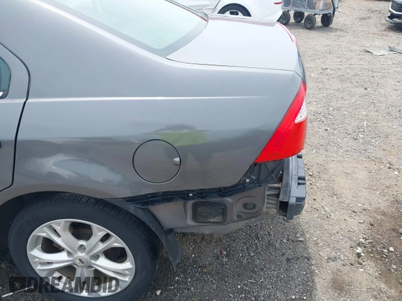 2012 Ford Fusion SE with VIN 3FAHP0HA9CR141588, listed as a IAAI auction lot 42485632 with 124,312 mi miles and . Bid and sale history available at DreamBid. Image 18.