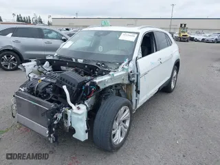 2021 Volkswagen Atlas Cross Sport 3.6L V6 SEL with VIN 1V2EE2CA1MC228616, listed as a IAAI auction lot 41231626 with 46,369 mi miles. Bid and sale history available at carsss.com. Image 2.