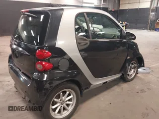 2010 Smart fortwo Pure with VIN WMEEJ3BA7AK402342, listed as a IAAI auction lot 42417829 with 38,225 mi miles and . Bid and sale history available at DreamBid. Image 4.