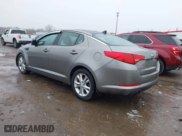 2013 Kia Optima EX z VIN 5XXGN4A72DG166687, wystawiony jako IAAI lot #41967631 z przebiegiem 202 712 mil mil oraz . Historia ofert i sprzedaży dostępna na DreamBid. Obrazek 3.