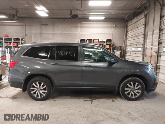 2019 Honda Pilot EX-L with VIN 5FNYF6H50KB035548, listed as a IAAI auction lot 42011724 with 105,195 mi miles and . Bid and sale history available at DreamBid. Image 13.