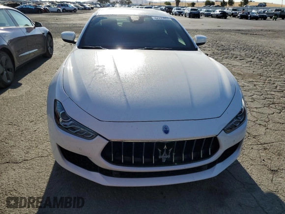 2018 Maserati Ghibli with VIN ZAM57XSA2J1304907, listed as a Copart auction lot 62223863 with 55,290 mi miles. Bid and sale history available at carsss.com. Image 5.