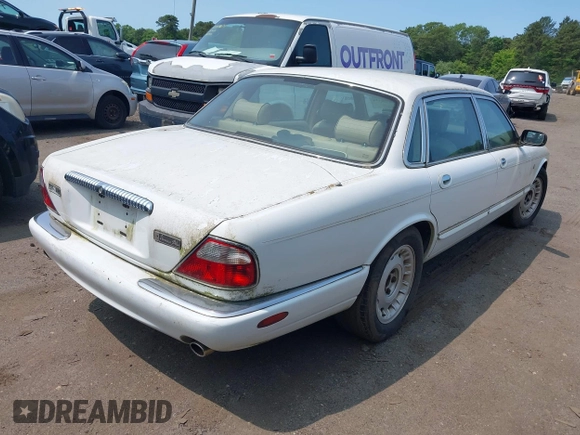 1999 Jaguar XJ z VIN SAJKD6045XC875524, wystawiony jako IAAI lot #42396434 z przebiegiem 167 104 mil mil oraz . Historia ofert i sprzedaży dostępna na DreamBid. Obrazek 4.